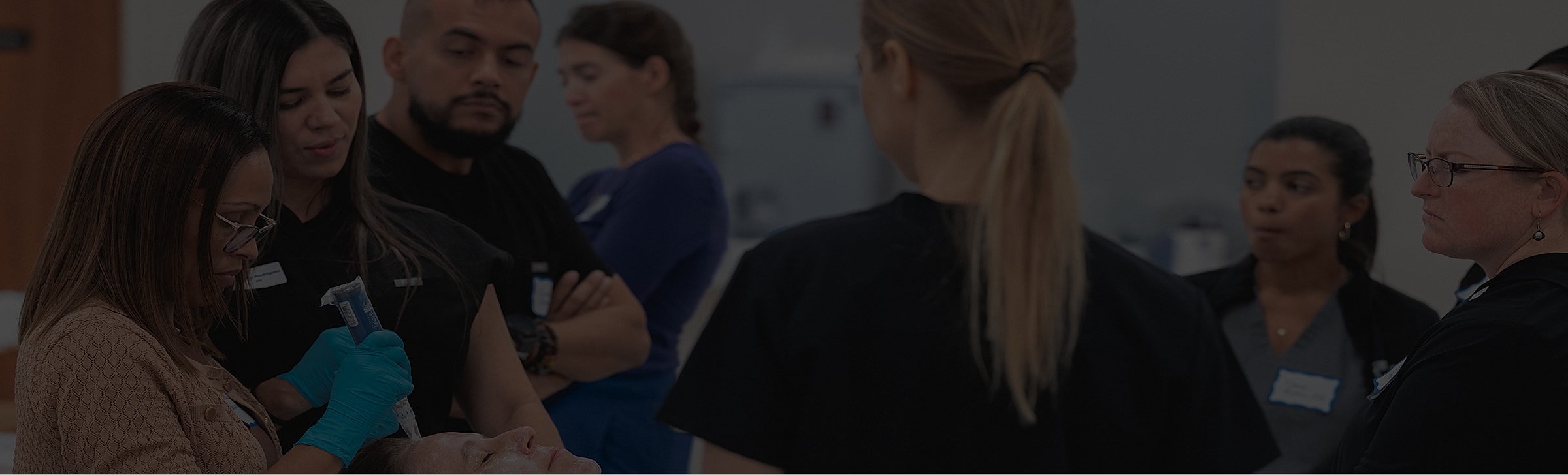 Medical training session with professionals engaged.