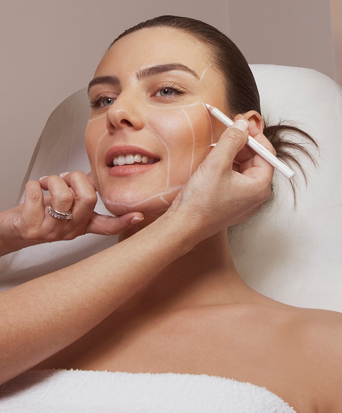 Medical professionals treating a patient's leg.