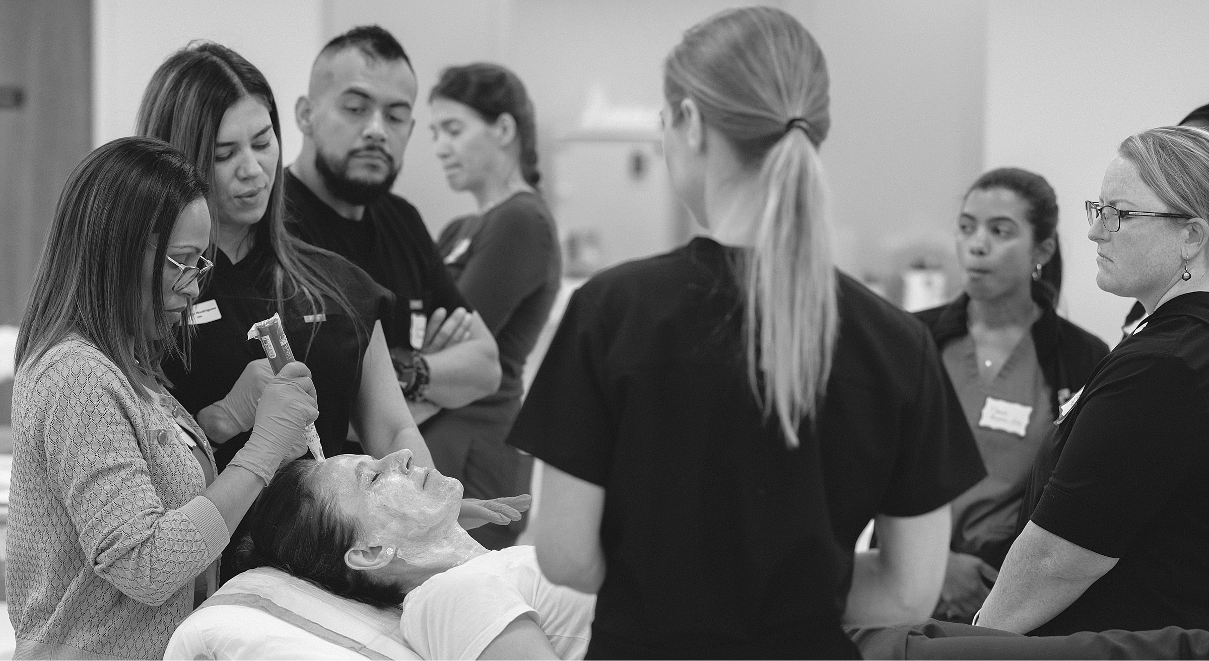 Group training session on skincare techniques.