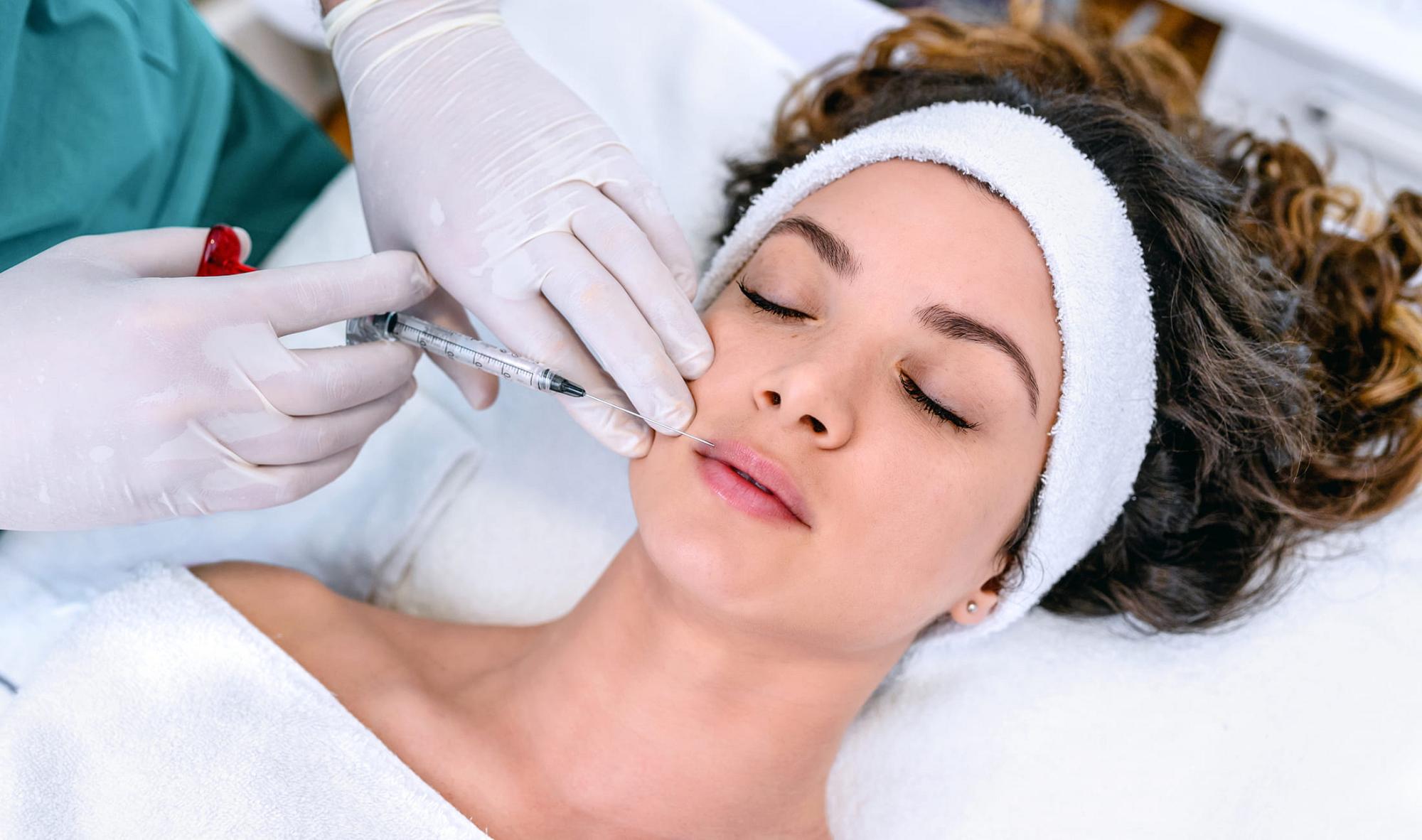 IV Therapy Essentials patient model smiling with her eyes closed
